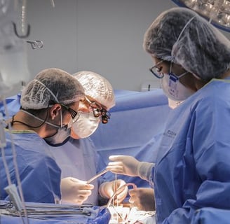 a group of surgeons performing surgery in a hospital