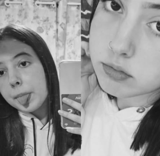 a woman with long hair and a white shirt