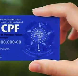 a person holding a blue card with a blue card