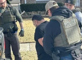 a group of police officers standing around a truck policia usa