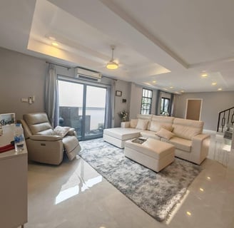 a living room with a couch and a television