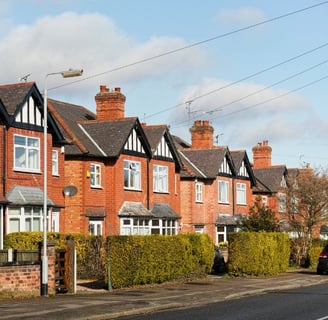 houses in Ironbridge with a car parked on the side of the road