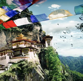 a mountaintop with a large group of flags and flags