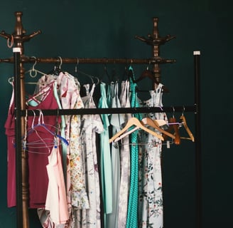 a rack of clothes hanging on a rack of clothes