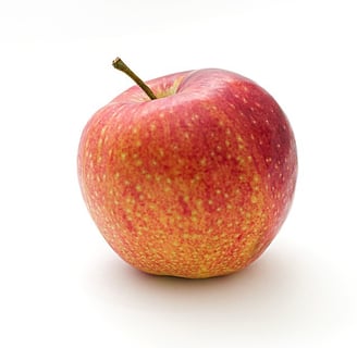 Red speckled whole apple