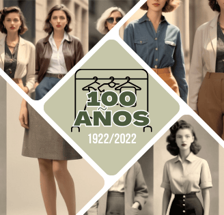a group of women in business attire standing in front of a group of women