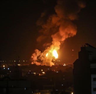 Smoke rises as Israel attacks Lebanon on Thursday Night