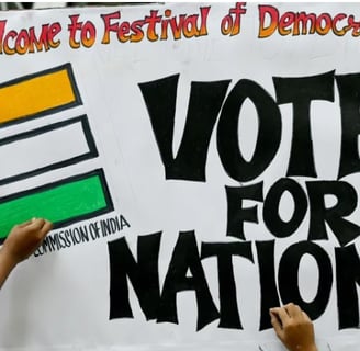 a woman holding a sign that says vote for the nation