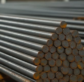 a pile of metal bars with a pile of metal bars