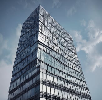 A modern high-rise building with a sleek glass facade and curved architecture against a clear blue sky. The structure features a prominent logo with the letters 'EY' on one of its sections.