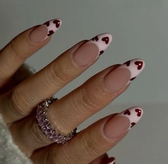 Valentine's nail inspo pink french with red chrome hearts