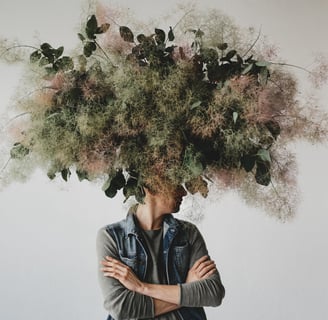 a man with a large head of flowers on his head