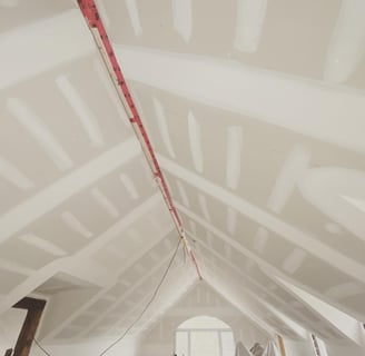 cathedral ceiling with new drywall coated with mud in Belleville, ON