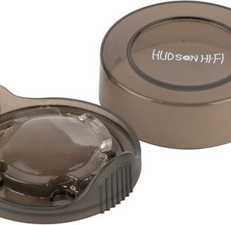 a close up of a brown plastic container with a hole in the lid