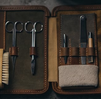 A collection of essential cat grooming tools displayed on a white background.