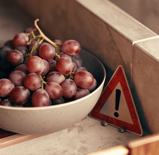 Grapes and raisins can harm a cat's kidneys.