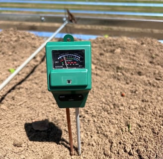 soil tester in dirt