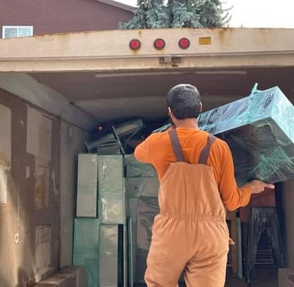 Best affordable reliable movers in Edmonton lifting and packing truck