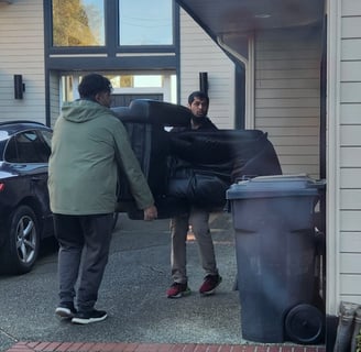 Best affordable reliable movers in Edmonton lifting furniture couch. Fast efficient movers delivery