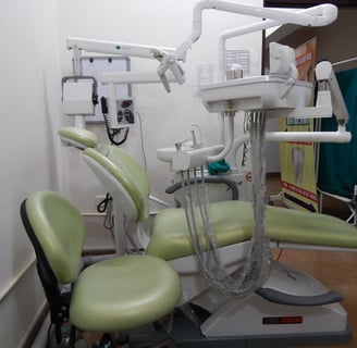 dental chair with doctor stool in a teeth clinic