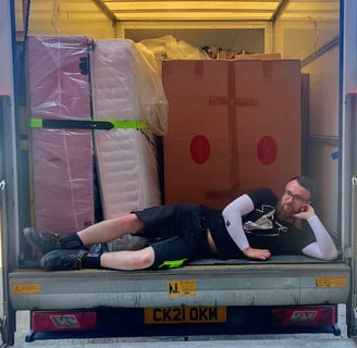 Me, stephen butler, in my uniform and the contents of Luton van