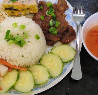 a plate of food with rice and vegetables