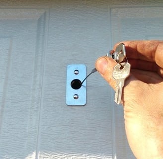 Emergency keyed vault release garage door opener.