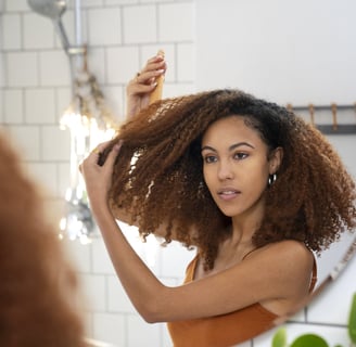 taking care with curly hair with hair tonic