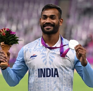 Kishore Jena with silver medal at Asian Games 2023