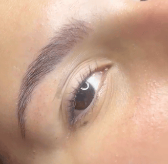 a woman with a black eyeliners and a black eyeliners Sol Contreras