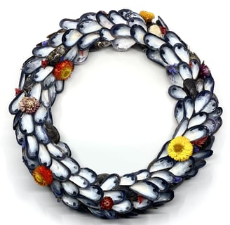 a wreath of mussels and flowers