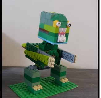 Dinosaurio T-REX hecho con piezas de Lego.
