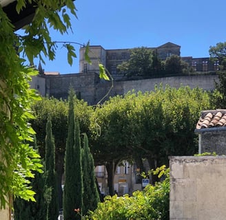 a building with a tower in the background