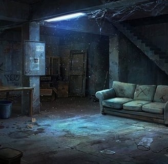 a couch in a dark room with a couch and a table