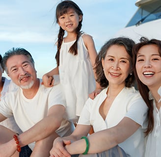 a family of four people posing for a picture