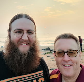 Handsome Akhada men at sunrise at Rock Beach in Puducherry