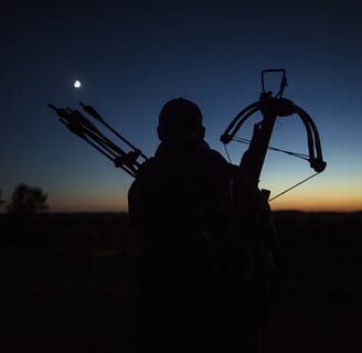 a man holding a bow and a bow