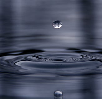 a drop of water in a pool of water