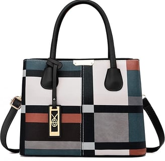 a woman's handbag with a colorful plaid pattern