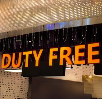 a sign that says duty free on a storefront