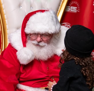 The Santa Cowboy listens to a childs special needs