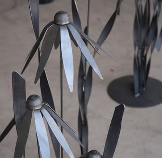 metal sculpture of flowers. Wisconsin Wrought Iron