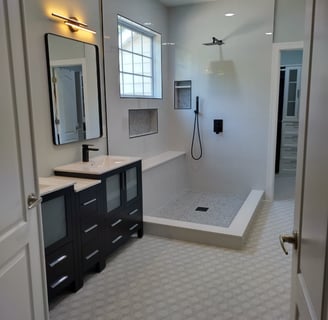 a bathroom with a shower and a shower