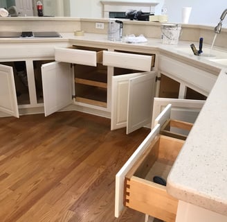 a kitchen with a sink and a counter top