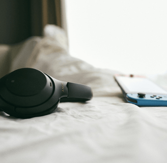 sony WH-1000XM4 headphones resting on a surface