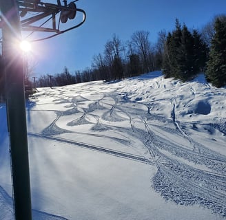 Skiing Snowriver resort in the upper peninsula of Michigan.