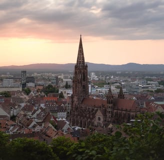 a church steeple with a steeple tower in the background