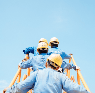 workers with blue uniforms