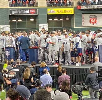 Atlanta Braves players on stage after defeating the Houston Astros on November 2, 2021.