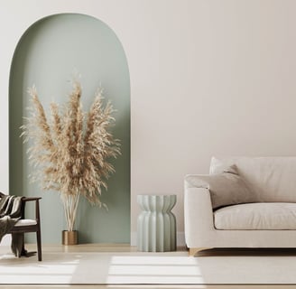 a living room with a couch and a chair